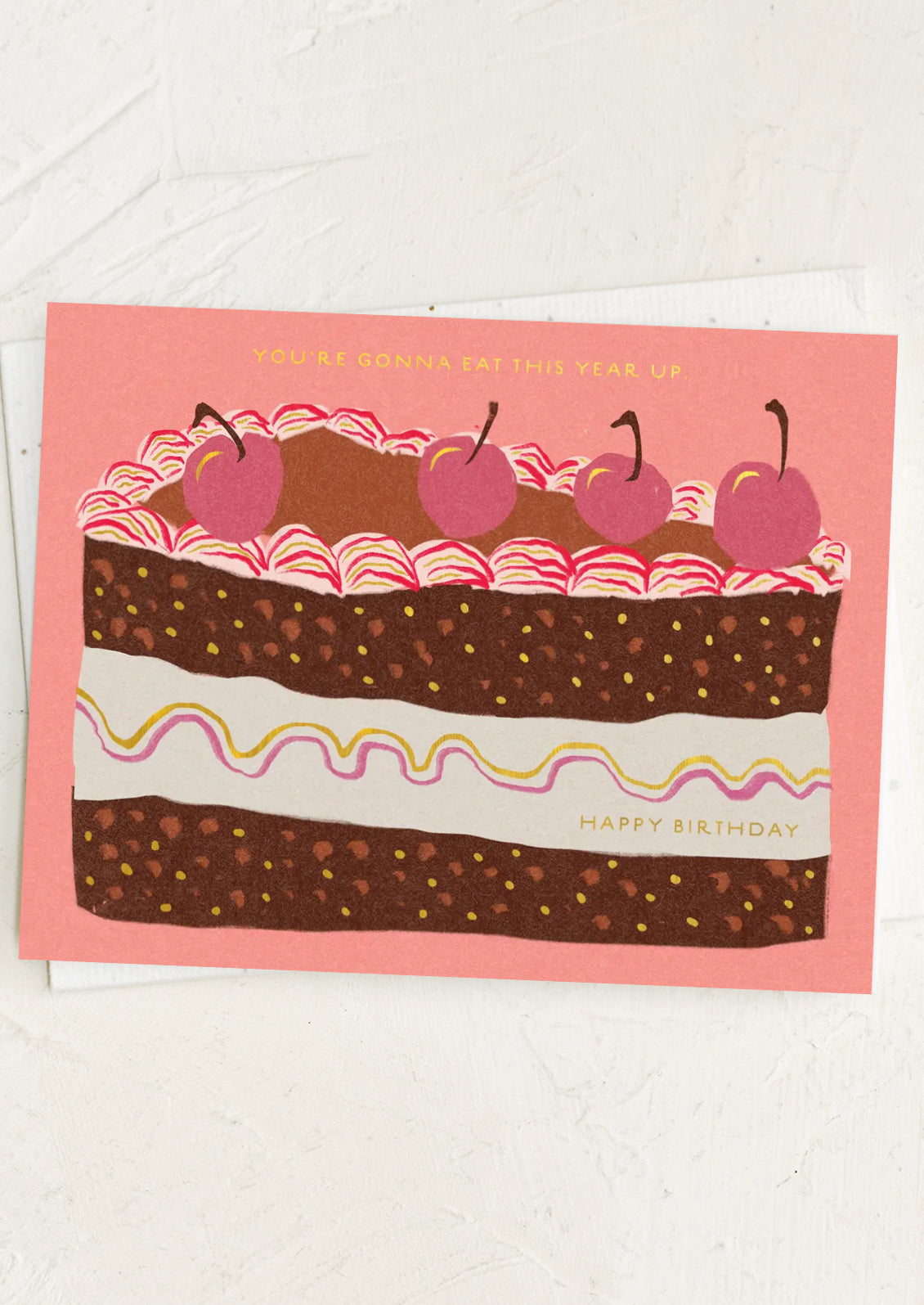 Birthday card with a cake illustration and text on a white background