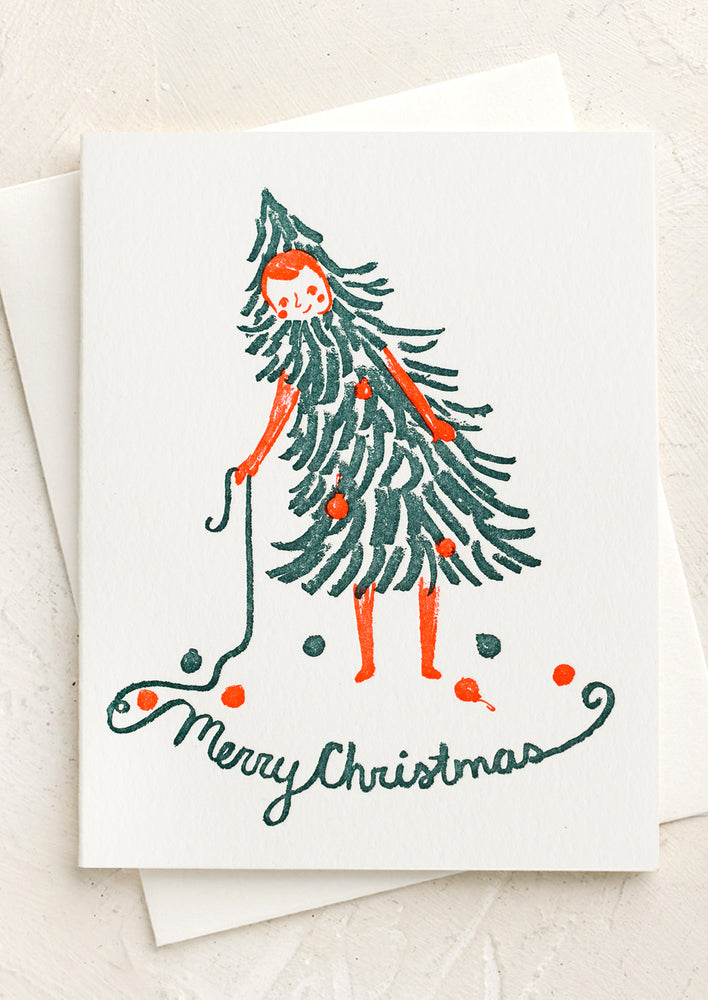 A letterpressed green and red Christmas card.