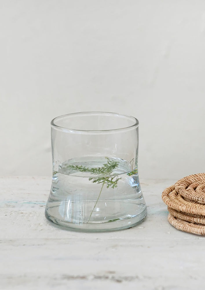 Clear / 10 oz: A clear tapered drinking glass.