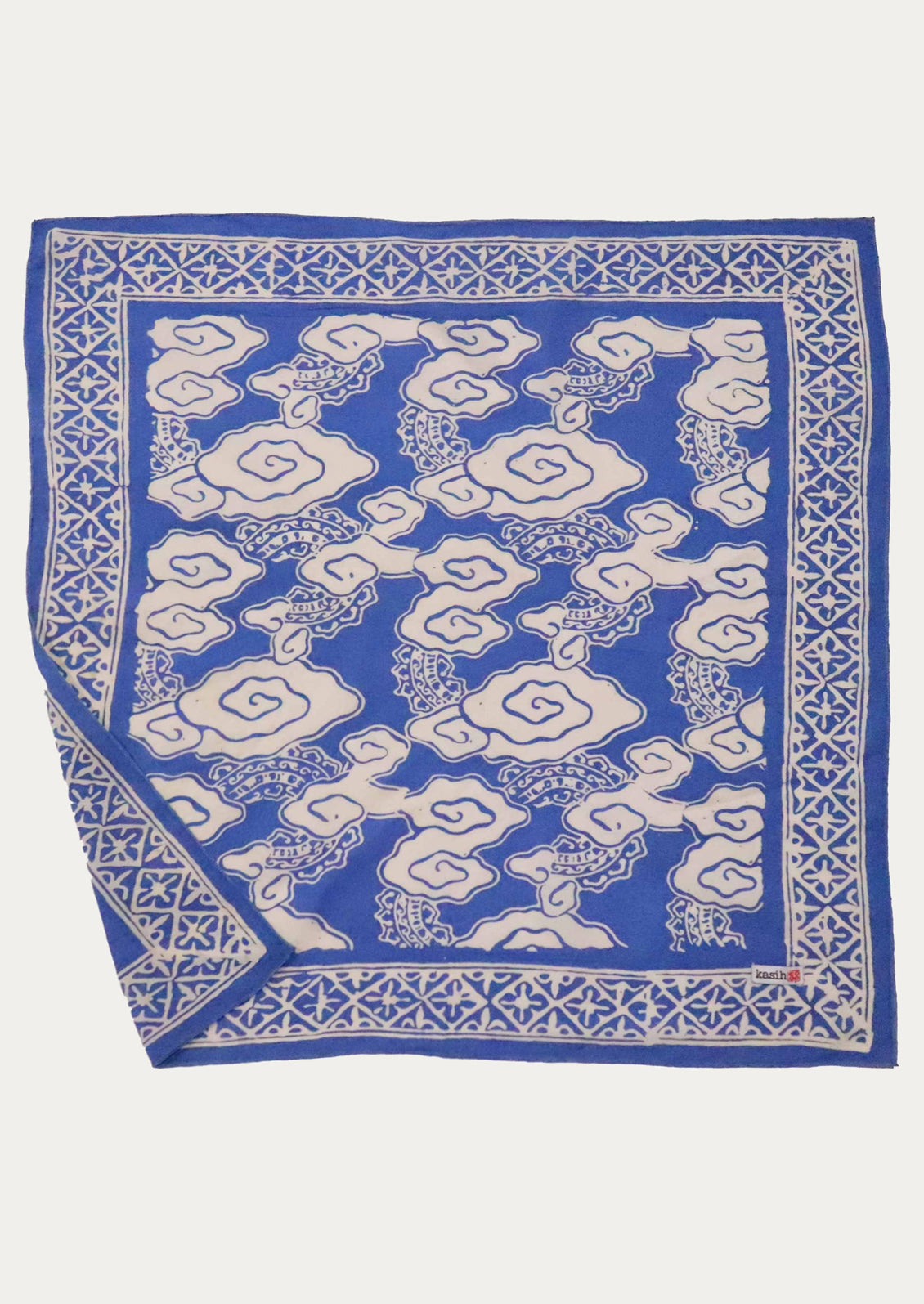 A blue and white cotton bandana with cloud pattern.
