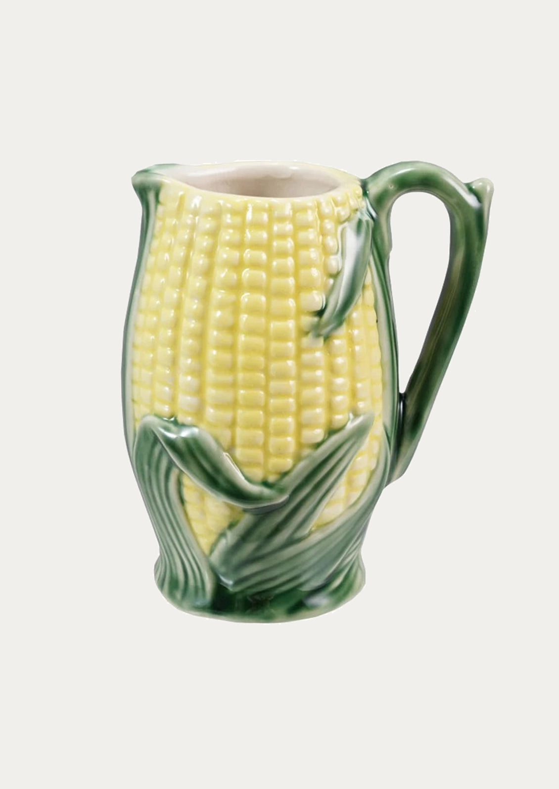 A ceramic pitcher resembling corn.