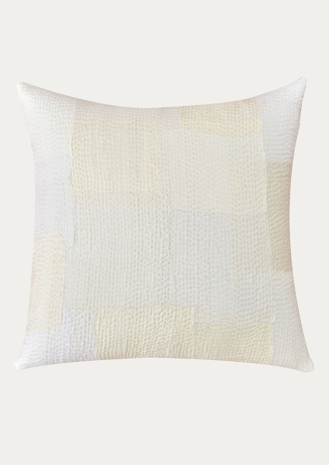 Textured pillow with a gradient from white to beige on a white background