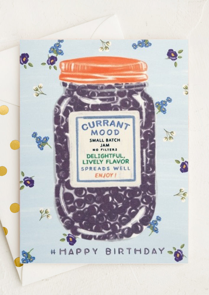 A card with illustration of jar of currants.