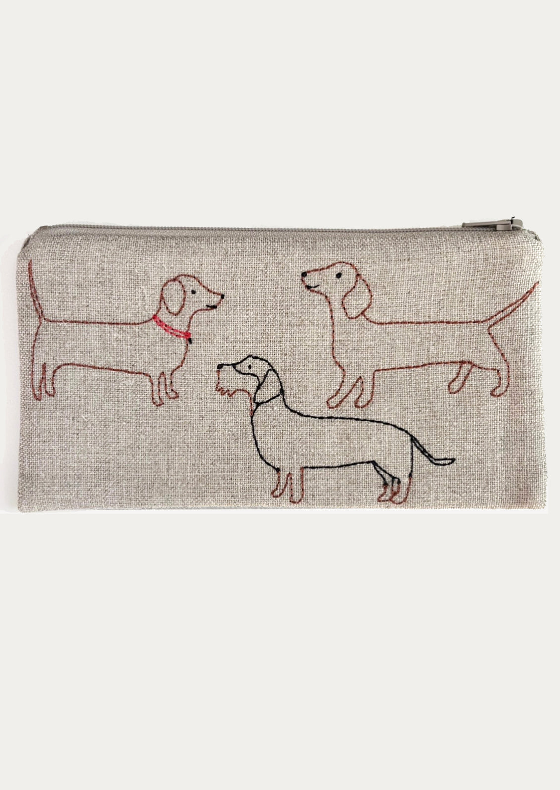 Pouch with embroidered dachshunds on a beige background