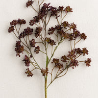 1: A faux sedum branch with dainty buds in aubergine.