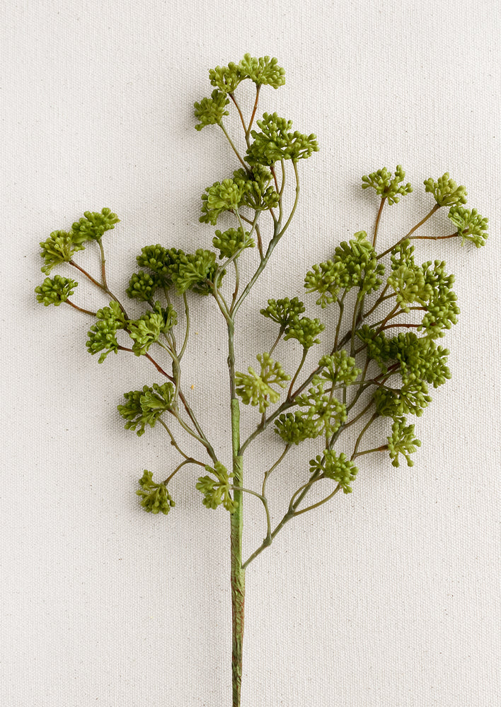 A faux sedum branch with dainty buds in green.