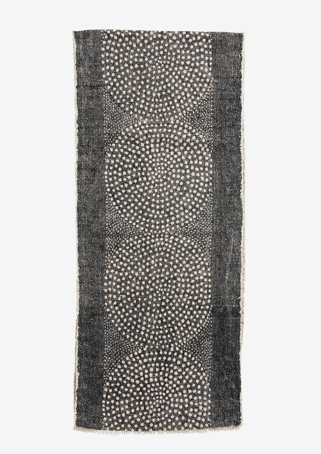 2: A charcoal table runner with cream medallion pattern.