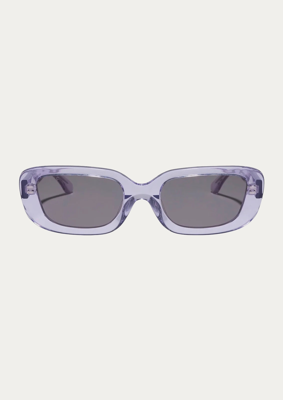 A pair of rectangular sunglasses with clear lilac colored frames.
