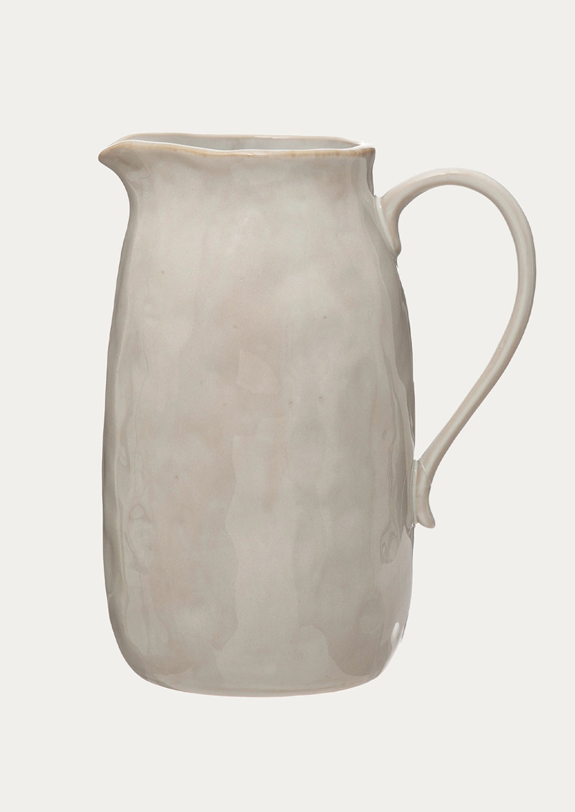 A white ceramic pitcher.