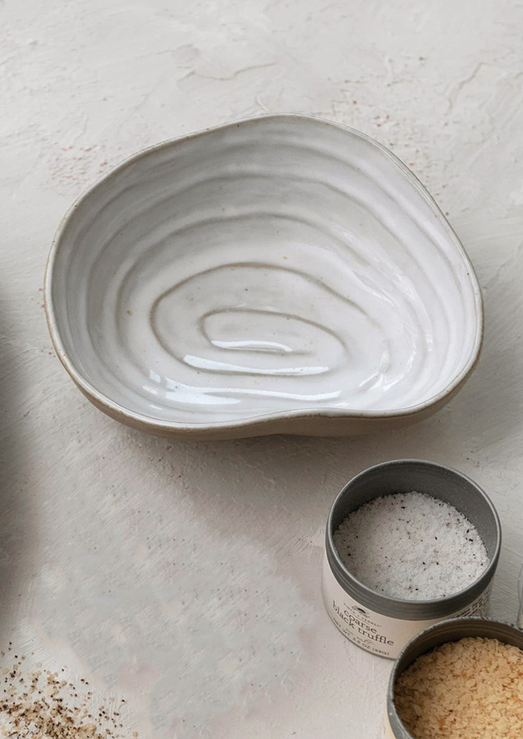 Serving Bowl: A serving bowl in the shape of a shell.