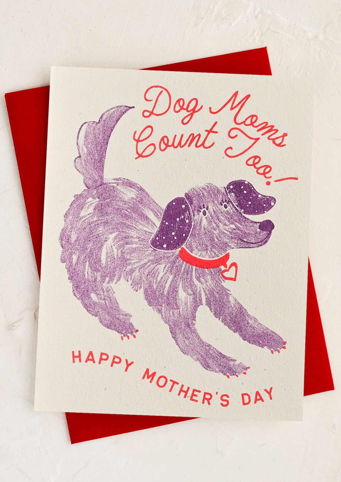 A card with image of dog, text reads "Dog Moms Count Too! Happy Mother's Day".
