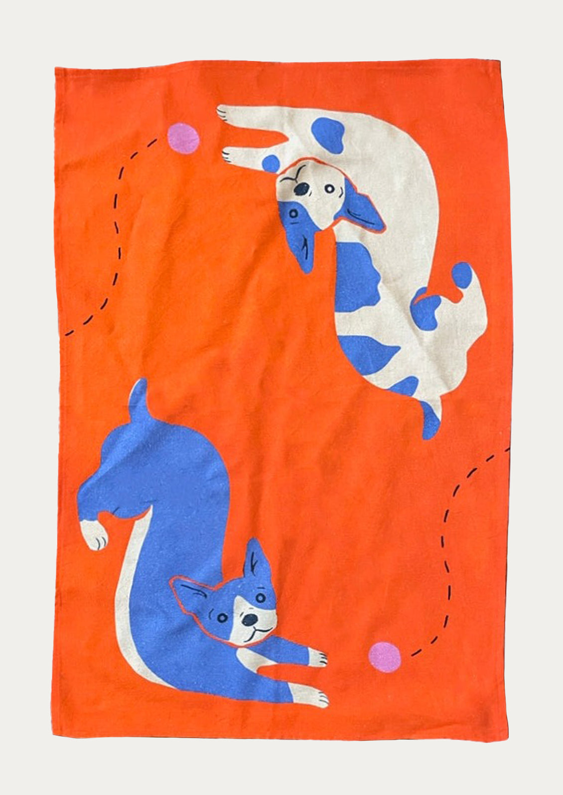 Orange tea towel with blue and white dog design