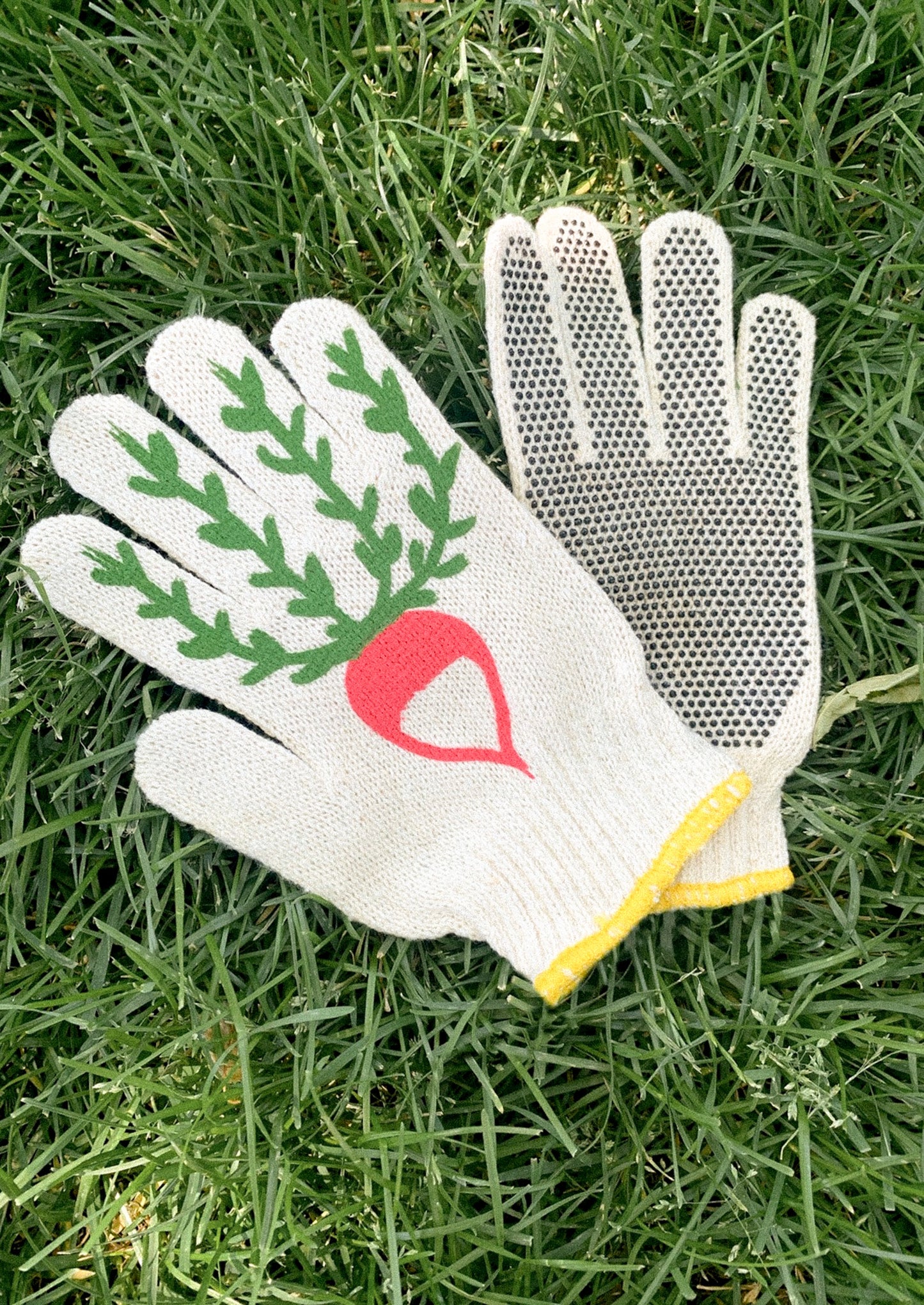 Gardening glove with a radish design on grass