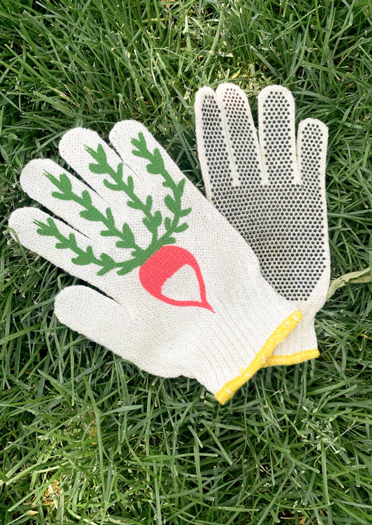 Gardening glove with a radish design on grass