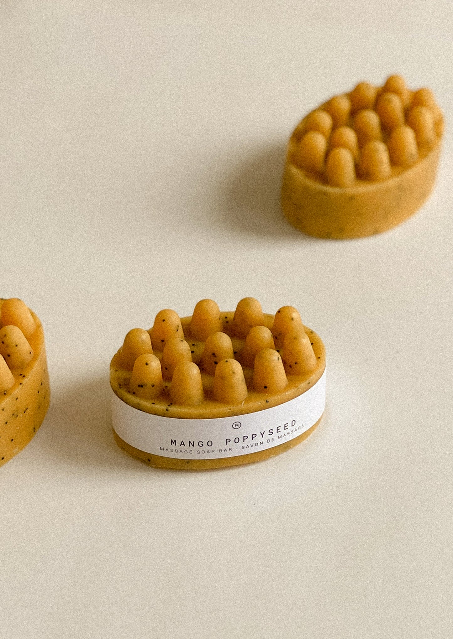 Two mango poppyseed massage soap bars.