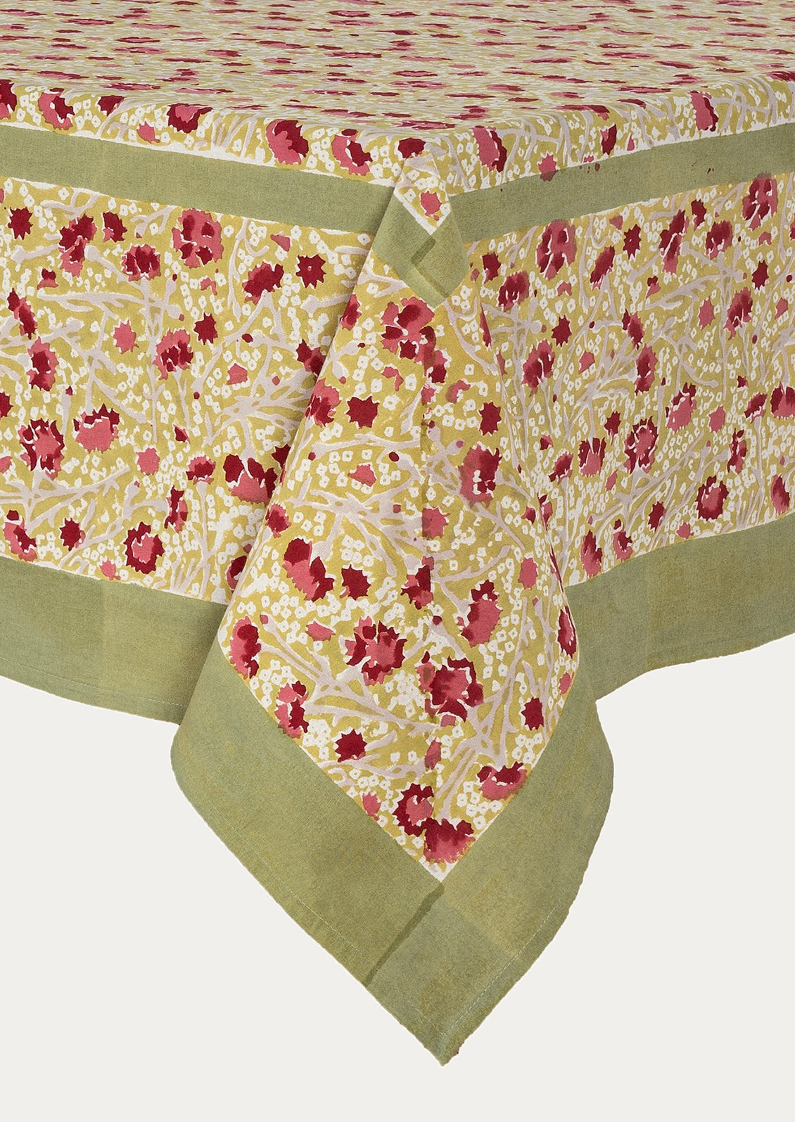 Floral tablecloth with red and pink flowers on a white background