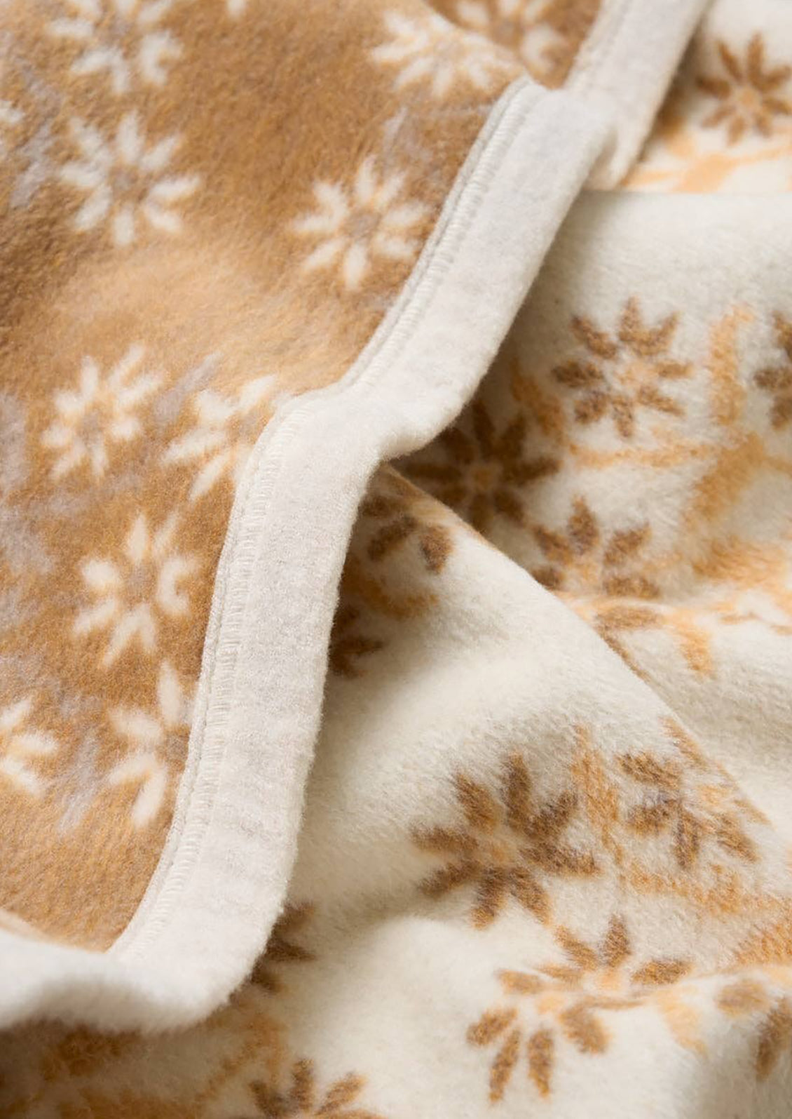 Close-up of a floral-patterned fabric with a white border
