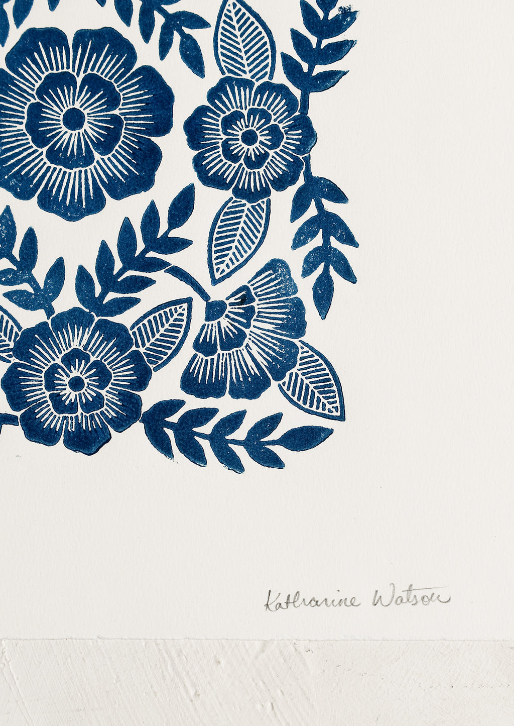 2: A woodcut floral print block print in indigo ink.