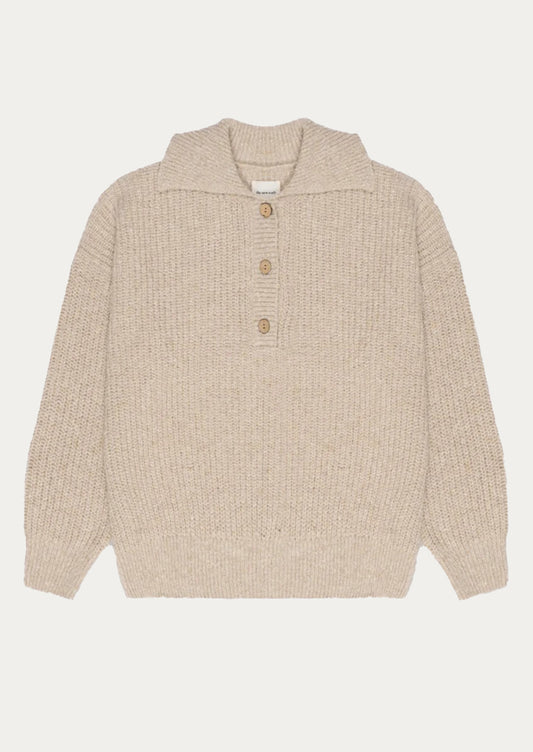 Beige knitted sweater with button details on a white background