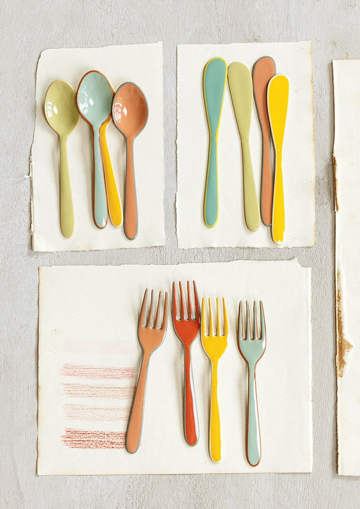 Colorful enamel spoon, fork and spreader knives in a fun mix of colors.