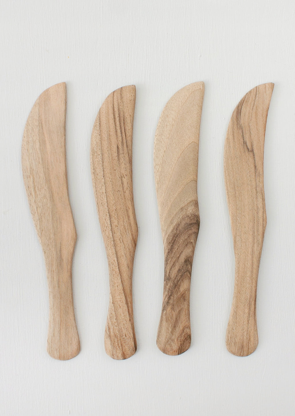 1: Assorted walnut wood cheese knives.