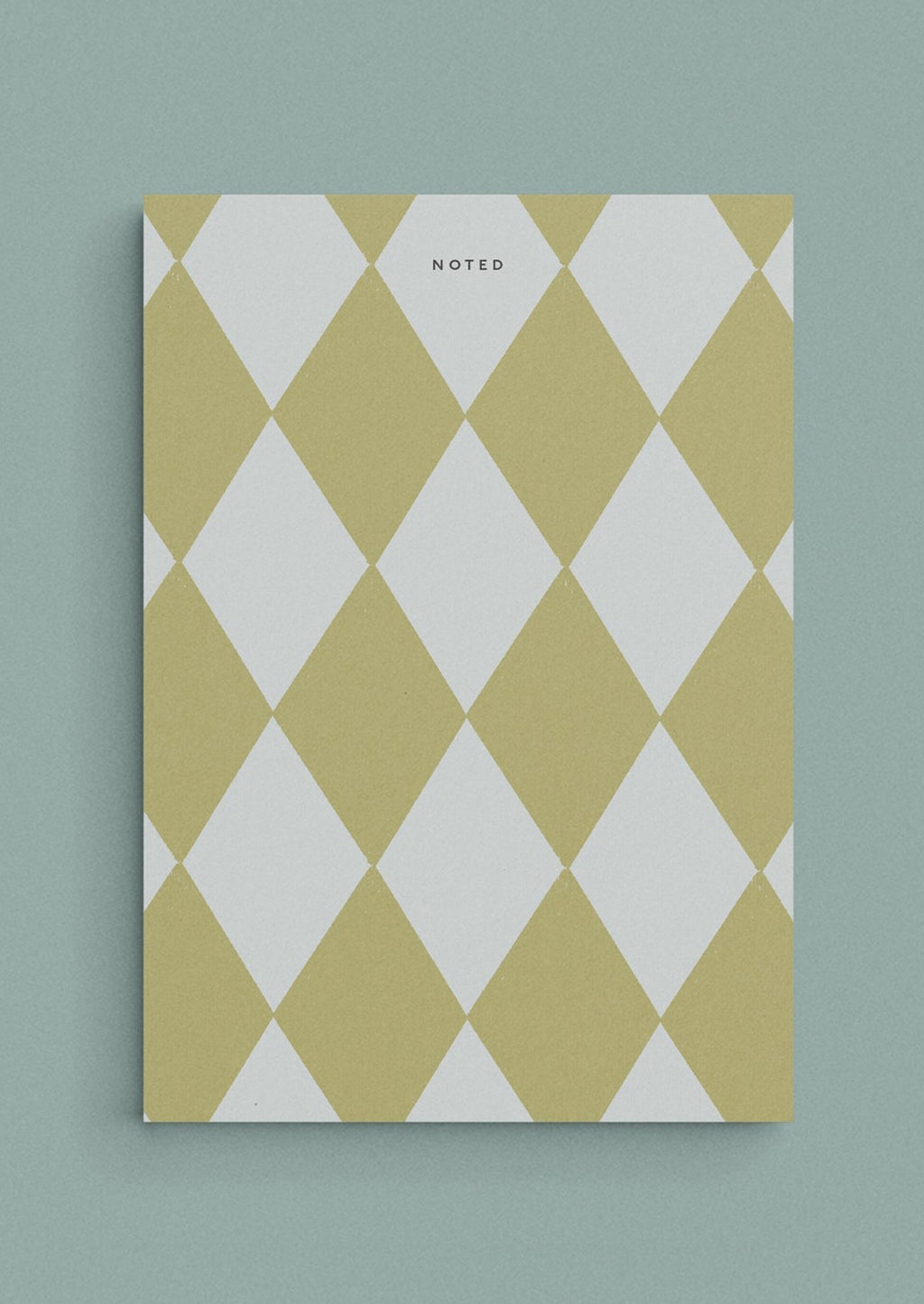 Cloud / Sage Multi: A diamond print notepad in green and light blue reading "NOTED" at the top.