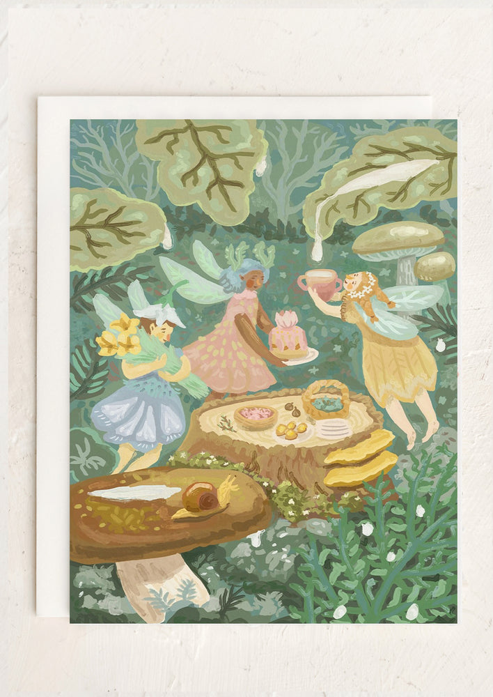 A blank card with whimsical illustration of fairies.