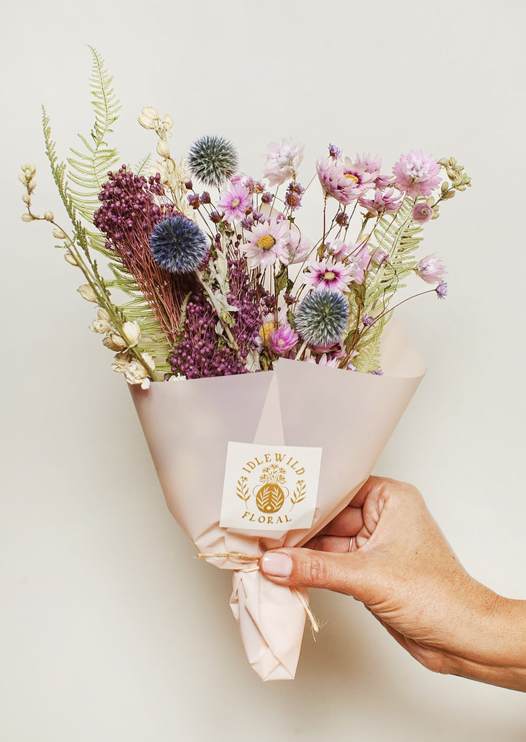 Twilight Multi: A dried floral arrangement in soft muted tones.