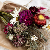 2: A dried flower bouquet in dark red and pink tones.