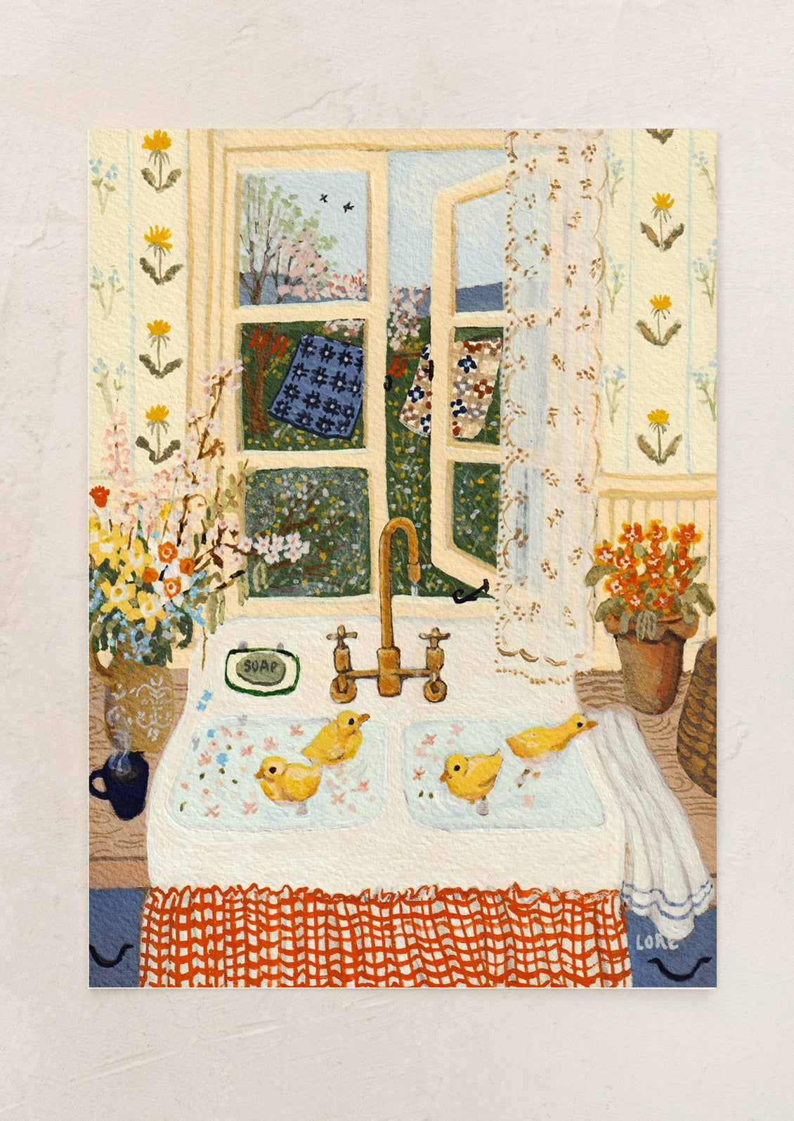 An art print of a painting of an open window above kitchen sink with baby chicks.