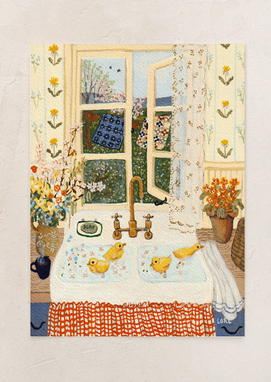 An art print of a painting of an open window above kitchen sink with baby chicks.