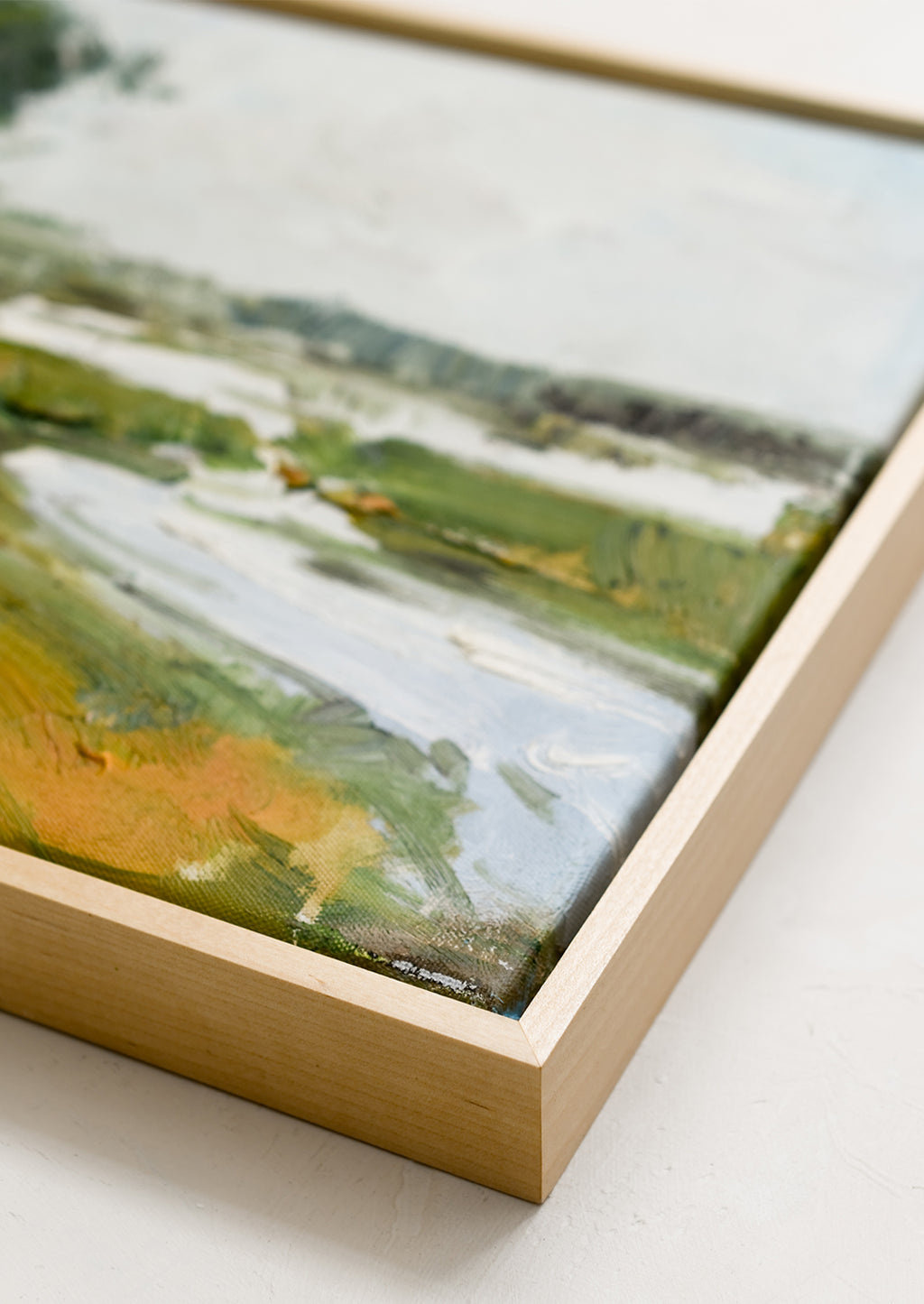 2: An original landscape oil painting in maple frame.