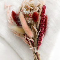 Maroon Multi: A dried bundle of flowers in maroon multi.