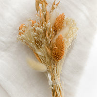 Peach Multi: A dried bundle of flowers in peach multi.