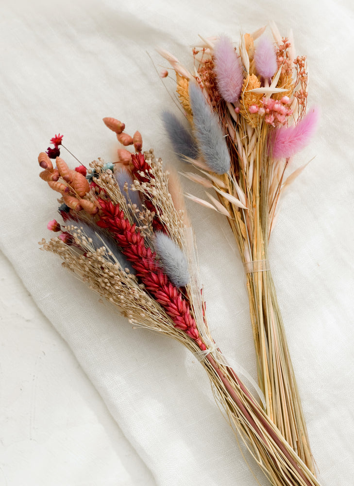 A dried bundle of flowers in pink multi.