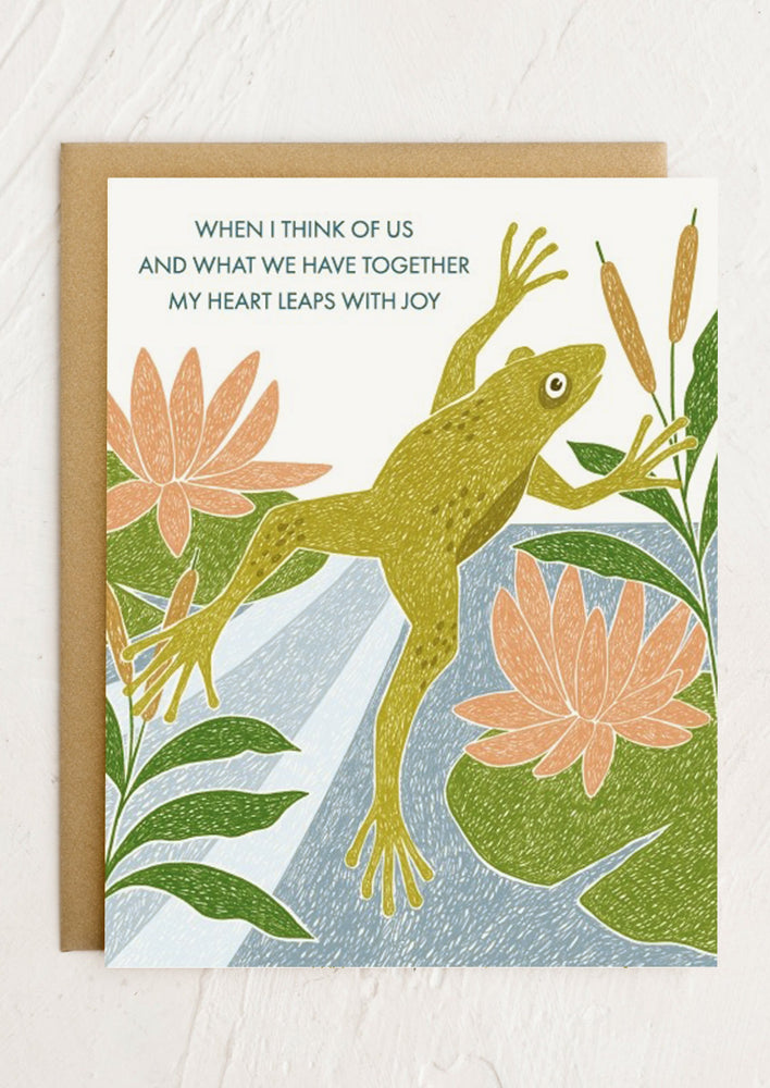A frog print card reading "When I think of us and what we have together my heart leaps with joy".