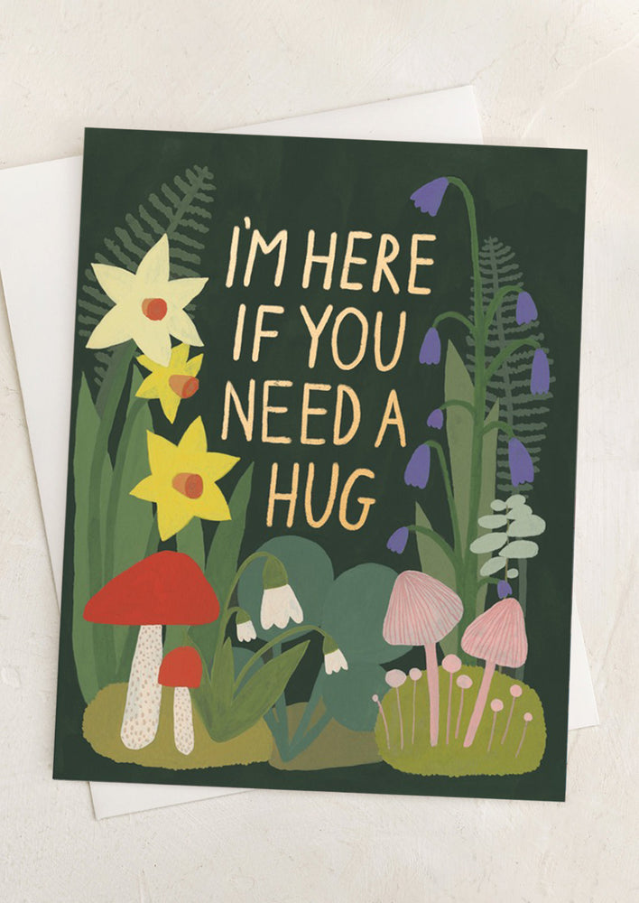 A floral print card reading "I'm here if you need a hug".