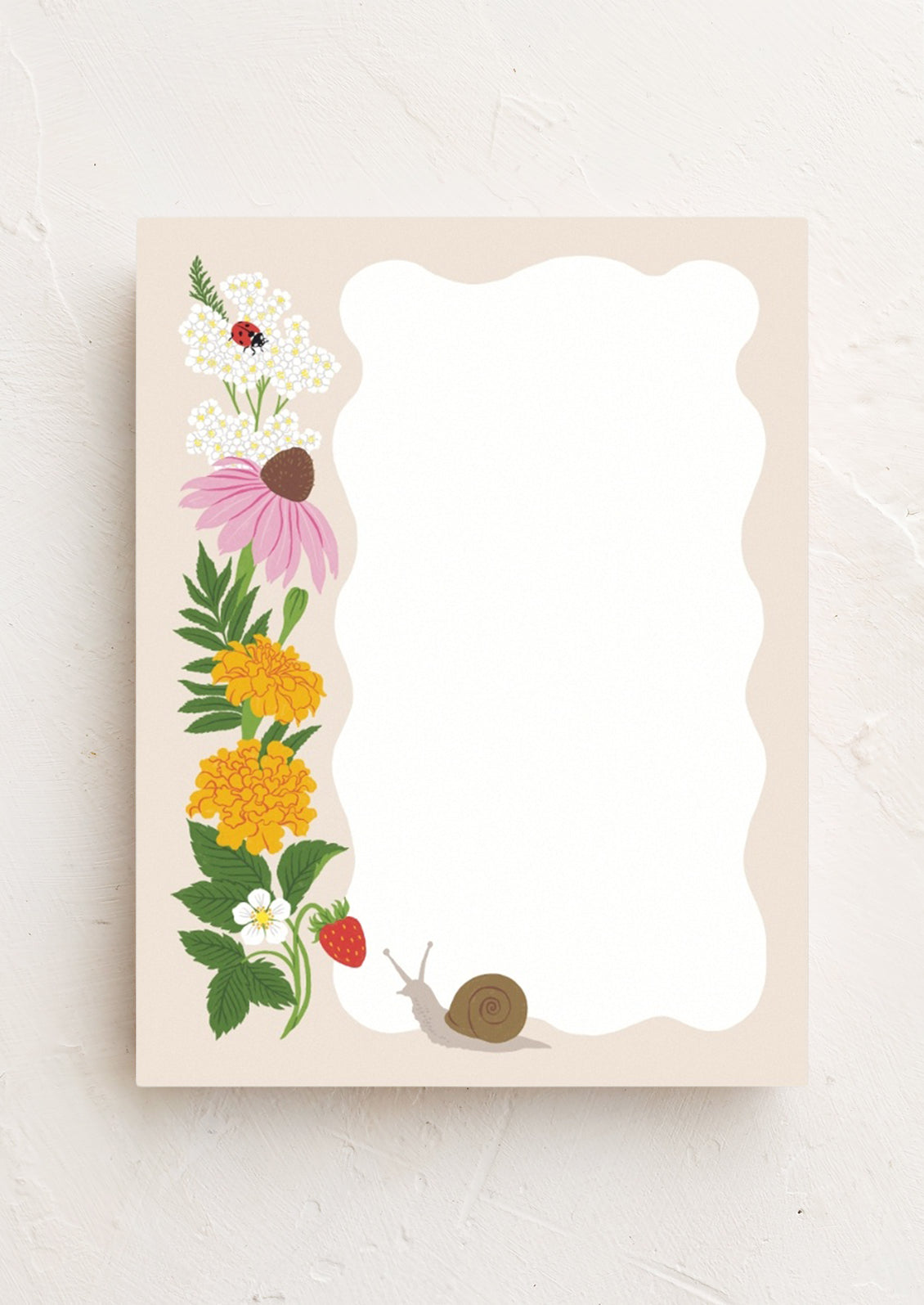 A notepad with ripple white section and an illustration of a happy snail and ladybug enjoying yarrow, marigold, coneflower, and fresh strawberries.