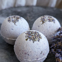 Sweet Lavender: Purple bath bombs with lavender buds.