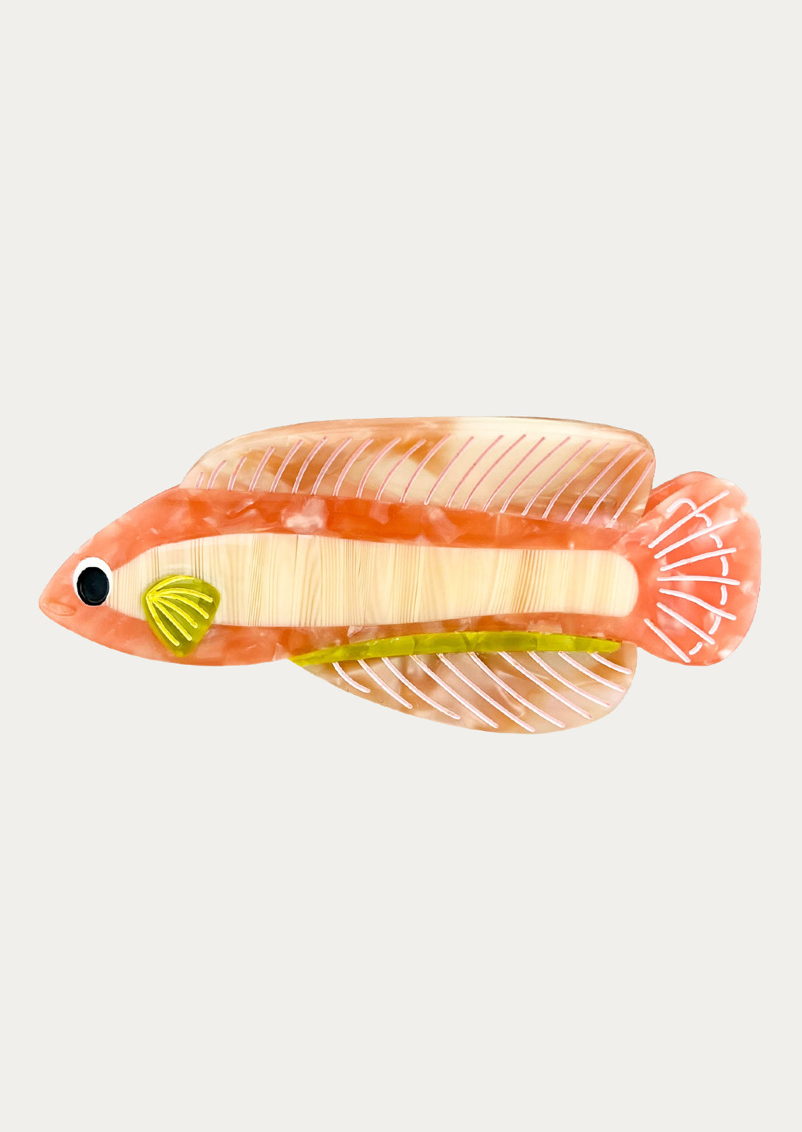 Fish hair claw on a light gray background