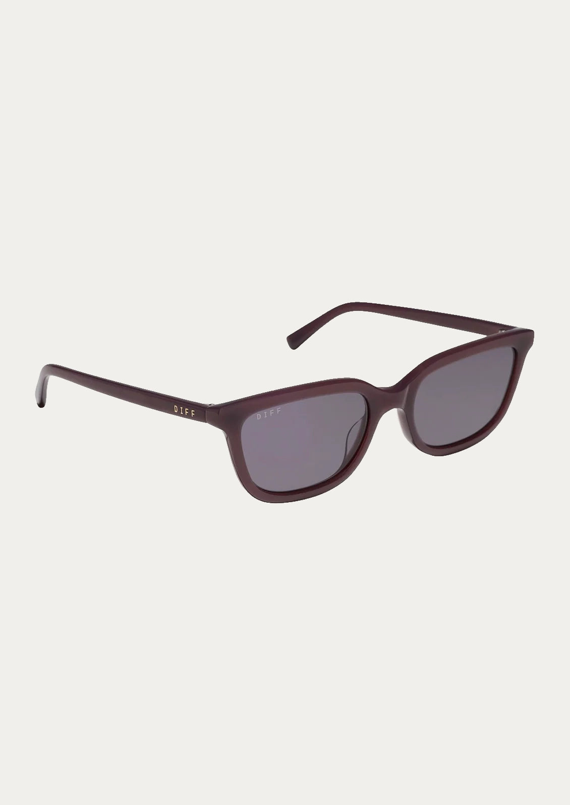 A pair of square sunglasses with plum colored frames.