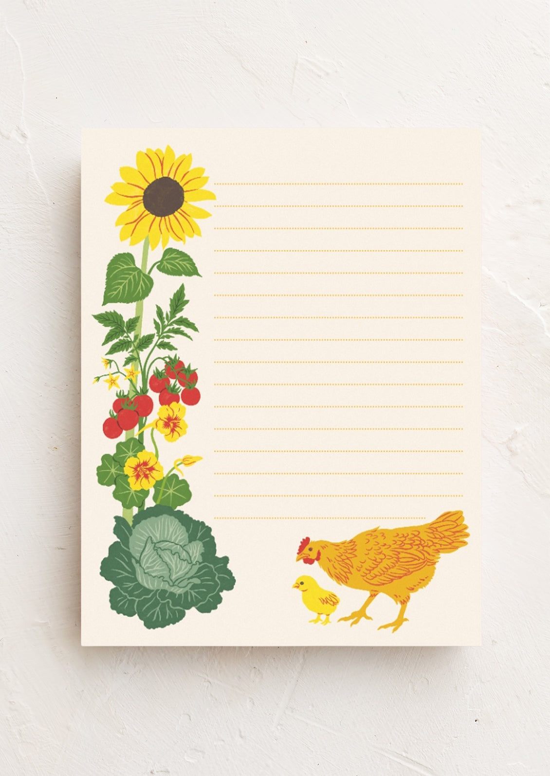 A notepad with ripple dotted lines and an illustration of a mother hen and baby chick exploring a vegetable garden with a large sunflower and tomatoes.