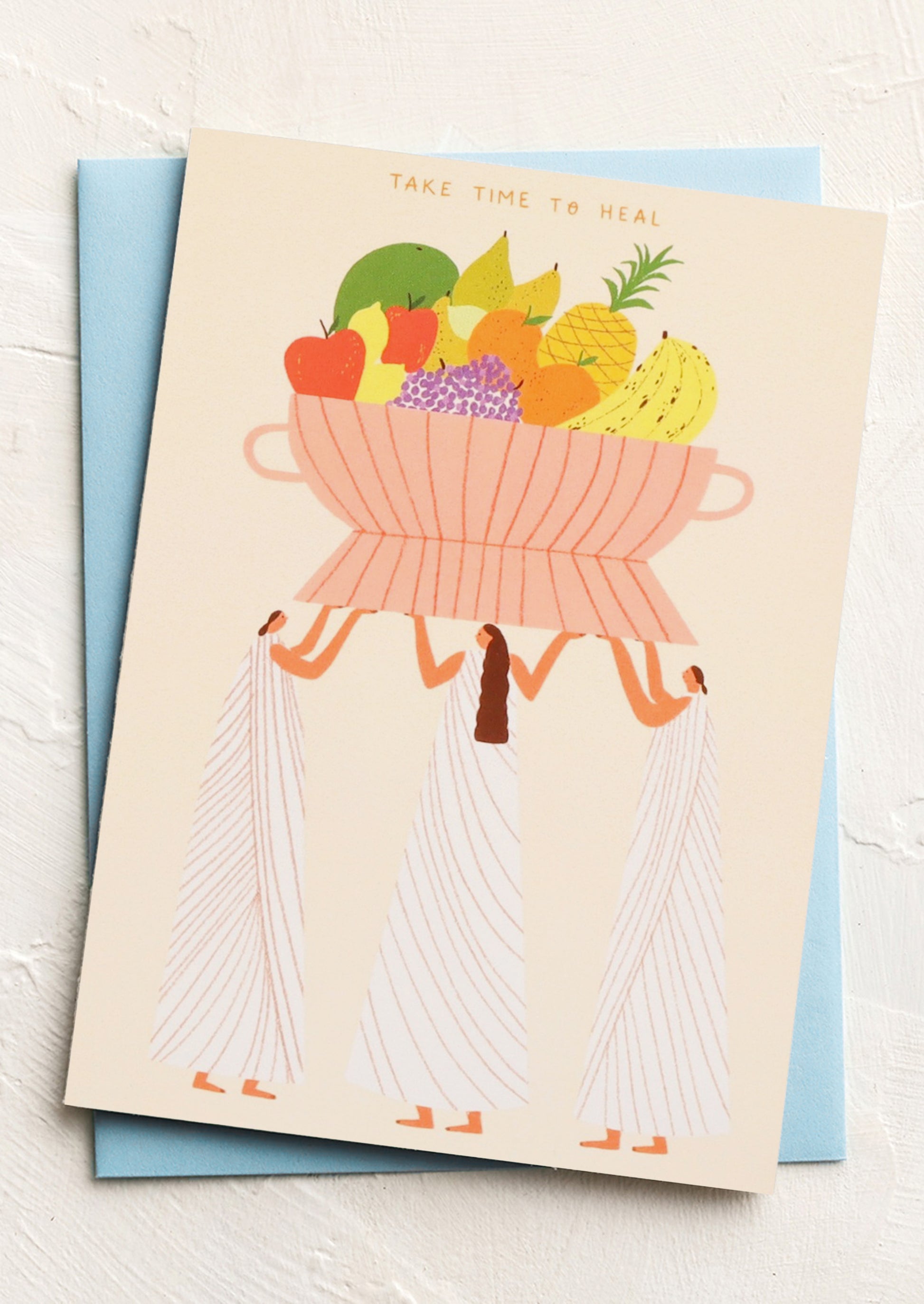 A greeting card with image of women holding a fruit bowl, text reads "Take time to heal".