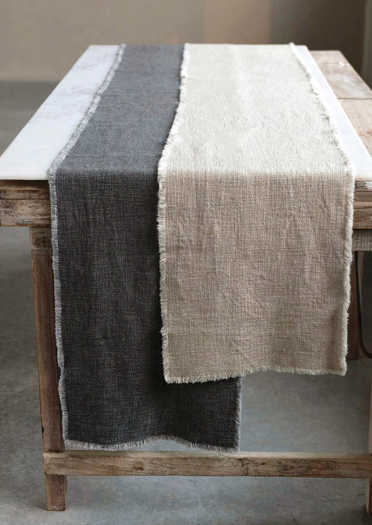 Linen blend table runners in beige and charcoal.