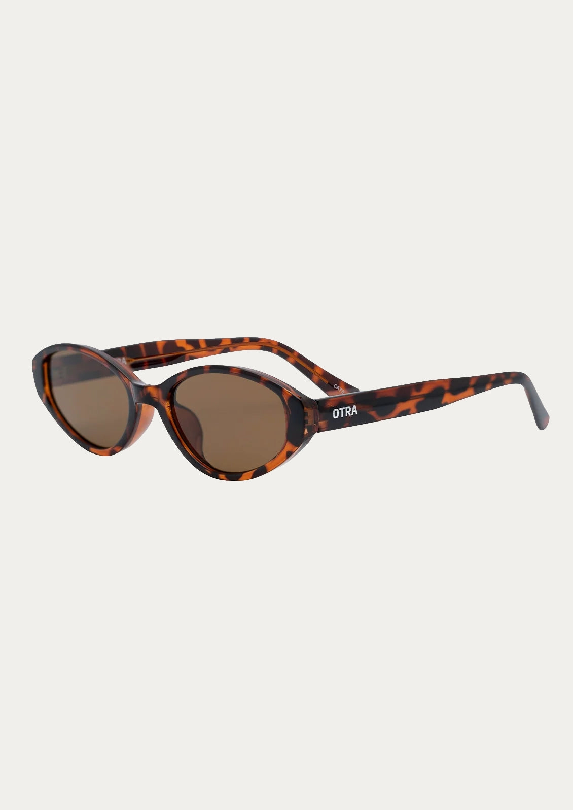 A pair of cat eye sunglasses with a tortoise frame and brown lenses.