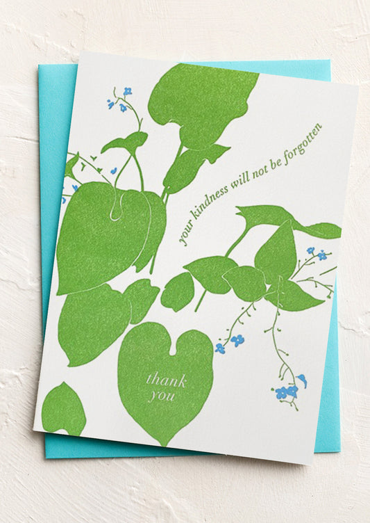 A greeting card with floral print, text reads "your kindness will not be forgotten".