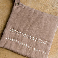 Clay: A cotton holder in clay with decorative contrast stitching in ivory.