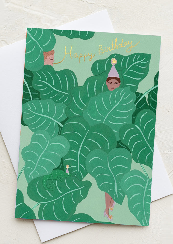 An illustrated leaf print card reading "happy birthday".