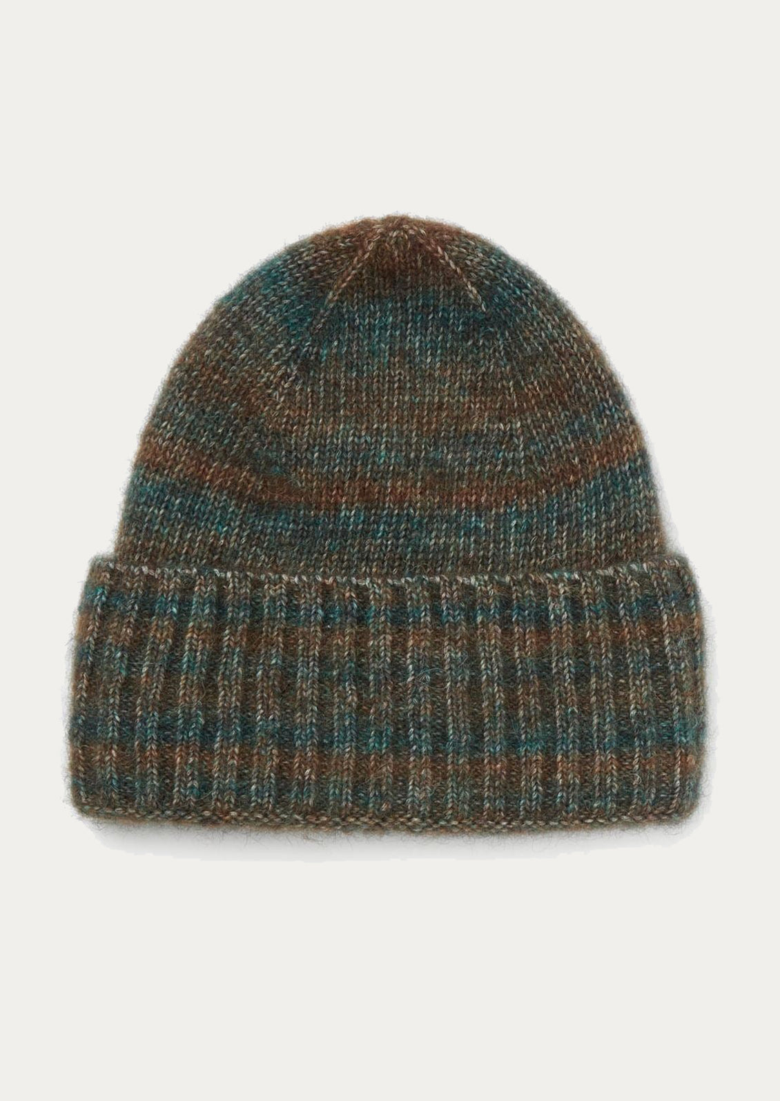 Knitted beanie with brown and blue pattern on a light gray background