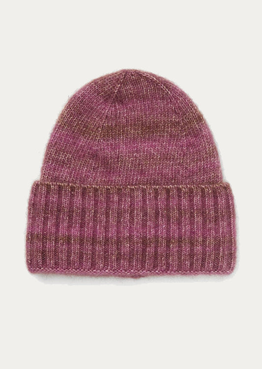 Purple knit beanie on a light gray background